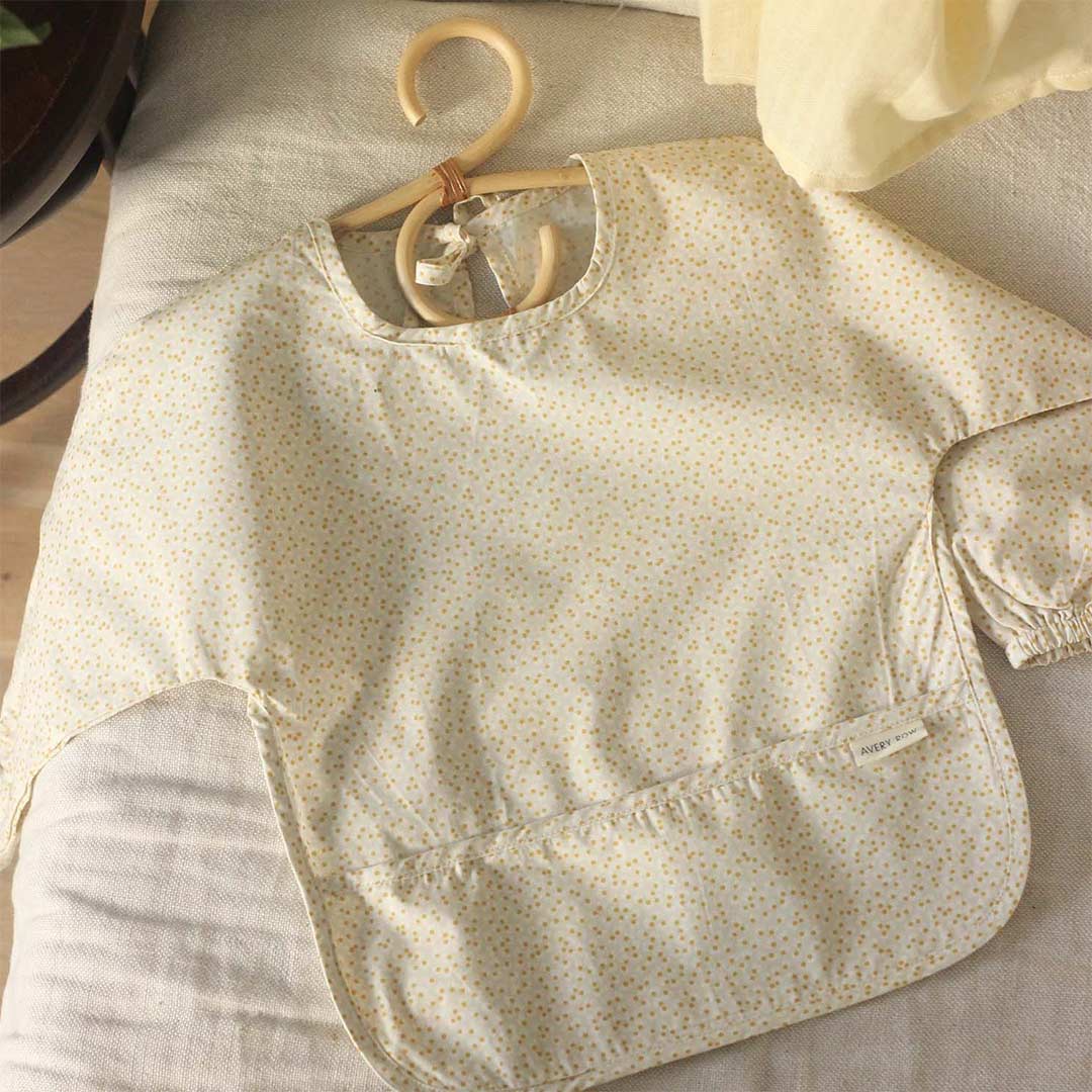 Avery Row Sleeved Bib - Daisy Meadow