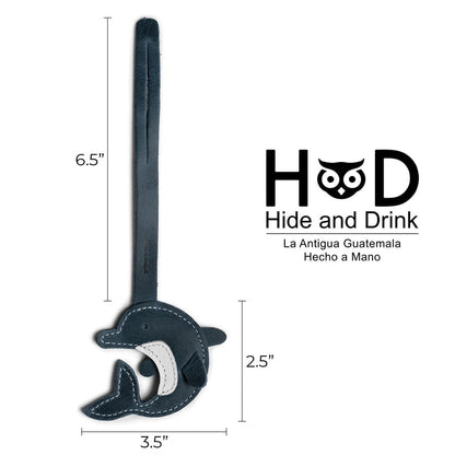 Hide & Drink Bag Charms illustrating dimensions for a charming monster design. This charm for handbags serves as a purse charm for tote & backpacks made from high-quality full grain leather. Capturing StockyardX's commitment to small batch production, each item features hand cut, hand sewn artistry and fire branding, handmade in La Antigua Guatemala & Oaxaca Mexico.