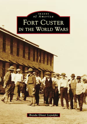 The cover is a sepia colored photograph of a group of men standing in front of an old building. A few of the men are in uniform and the others are dressed in vintage casual attire.