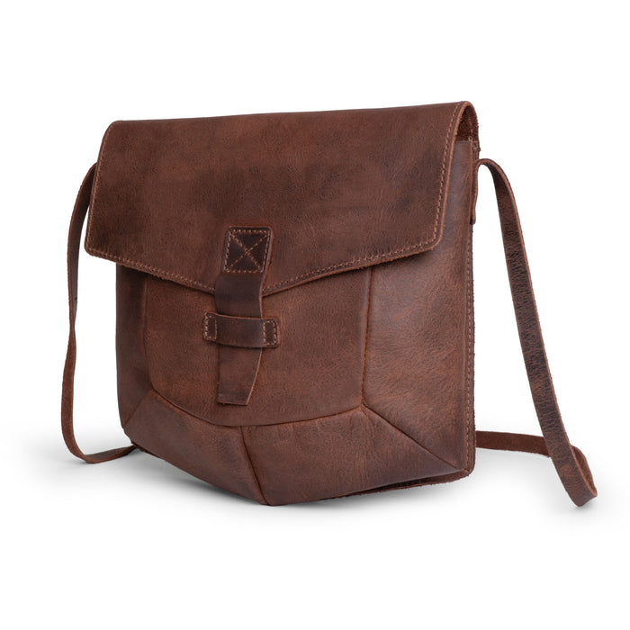 The Prisma Shoulder Bag by Hide & Drink features a vintage-inspired design with a unique Prisma shape. This small batch production vintage purse is made from full grain leather, showcasing its artisan craftsmanship. Perfect as a messenger or crossbody bag, it highlights the meticulous hand cut and hand sewn techniques used by artisans in La Antigua Guatemala & Oaxaca Mexico.