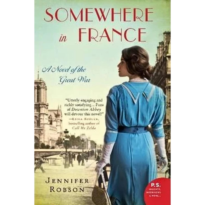 Book cover of Somewhere in France by Jennifer Robson, featuring Lady Elizabeth Neville-Ashford in a blue dress and hat holding a handbag, with historical buildings as a backdrop.