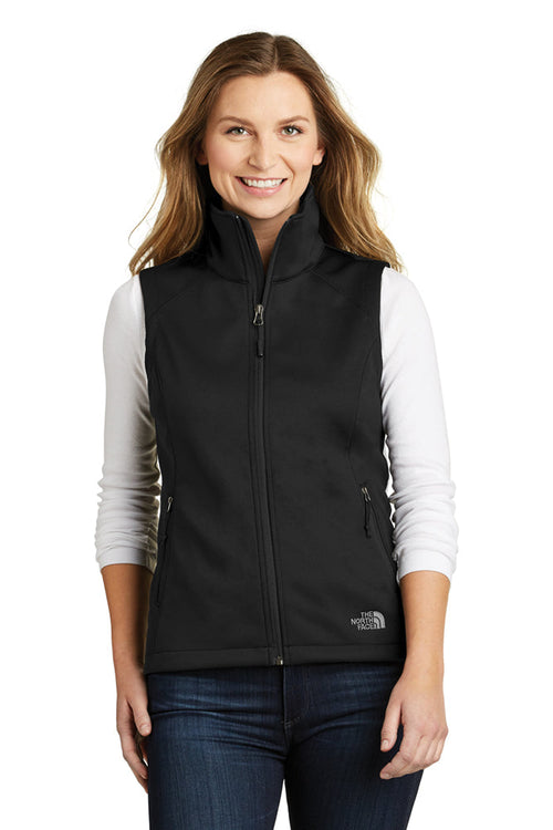 Female model in The North Face Ladies Ridgeline Soft Shell Vest in black, featuring full-zip front and a fitted silhouette with logo on left chest.